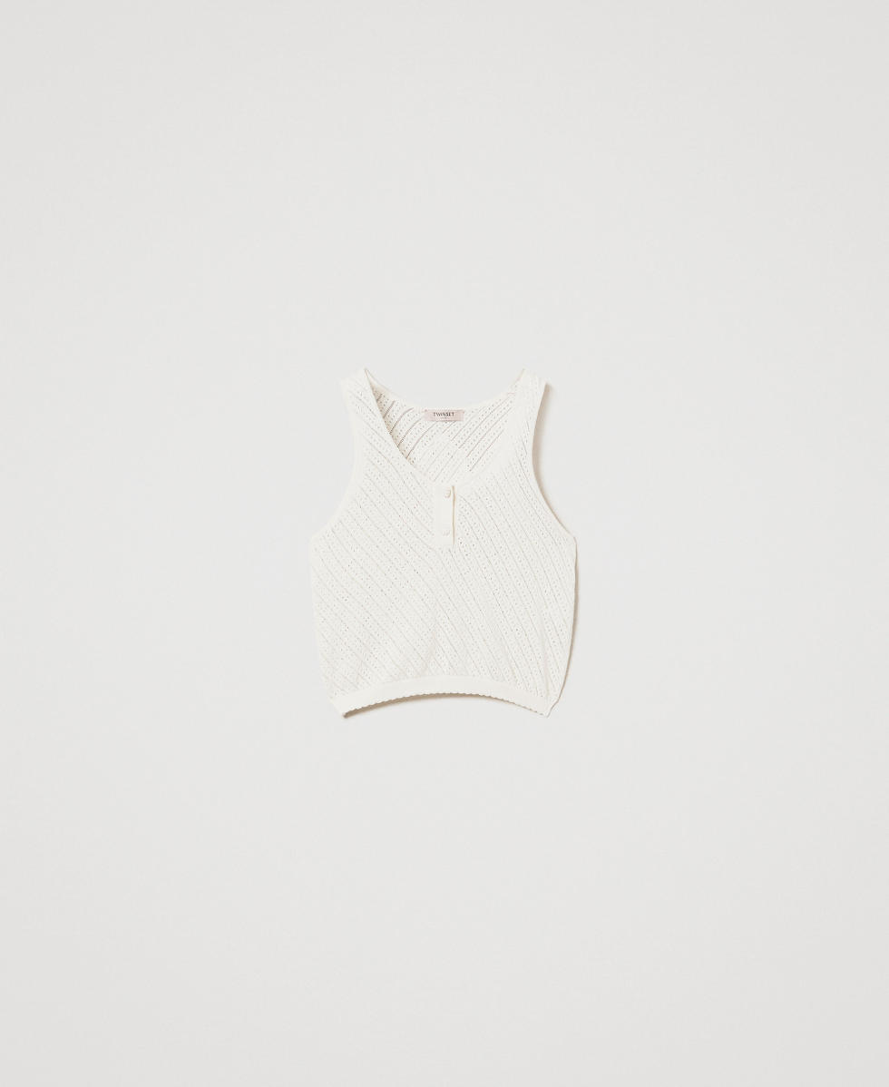 Knit top with embroidered patch