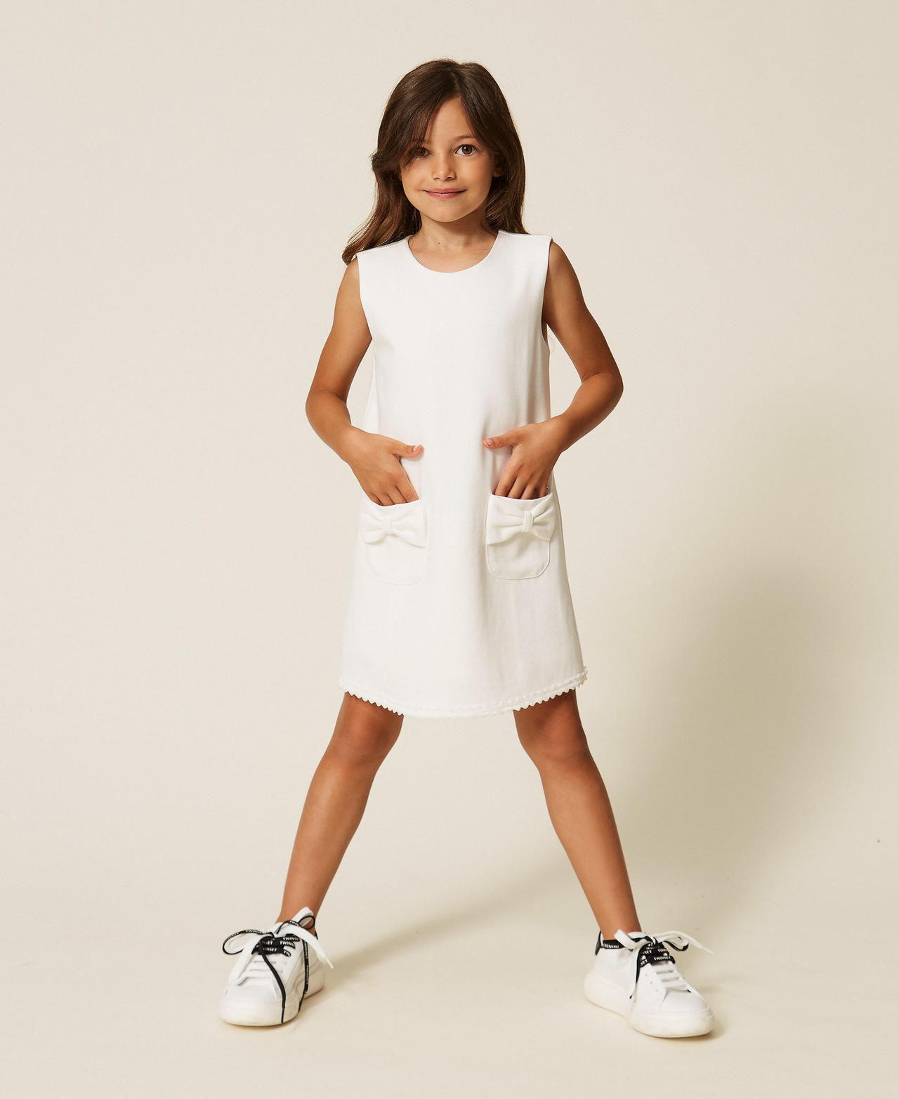 Short Baby´s dress with bows and velvet details