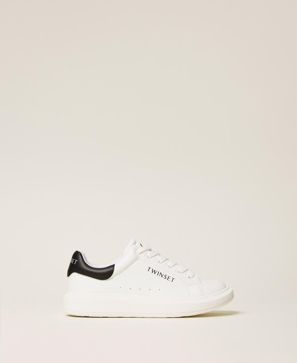 Trainers with laminated logo