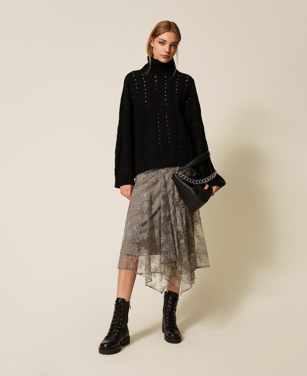 Longpullover aus Wollmischung mit Z&ouml;pfen Schwarz Frau 252TT3101_00006_T0