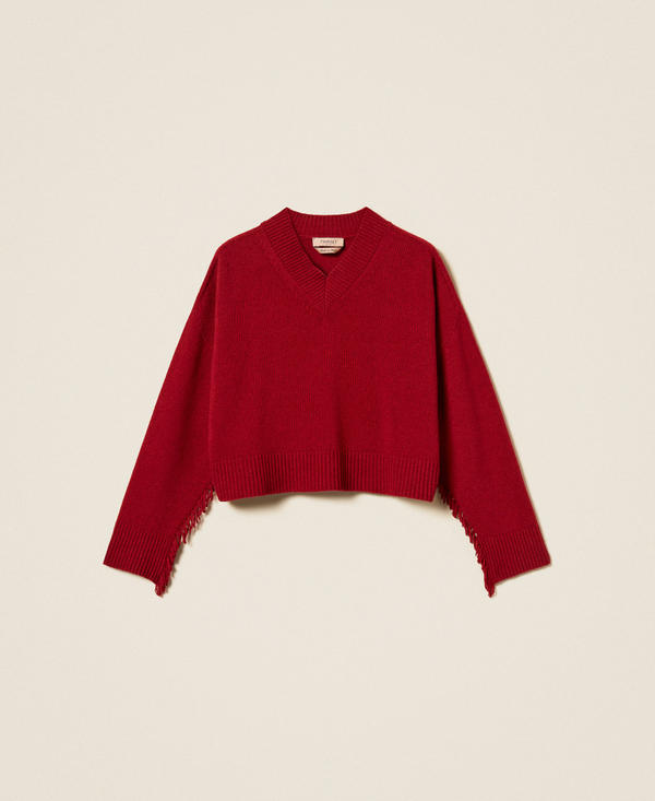 Wool blend jumper with fringes