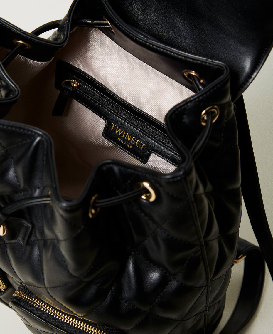 ‘Audrey’ quilted backpack with Oval T