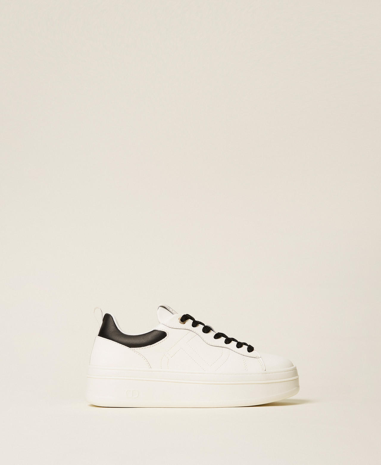 Płaskie sneakersy sk&oacute;rzane z logo Dwukolorowy Biały optyczny / Czarny Kobieta 252TCP024_01870_01