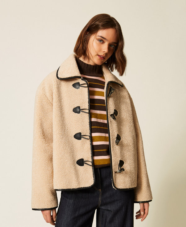 Faux fur caban coat with frog fasteners