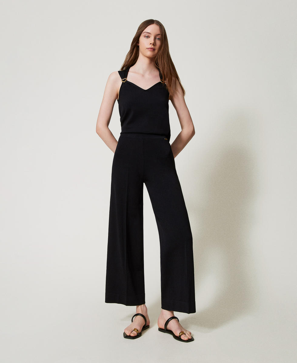 Knit trousers with lurex stripe