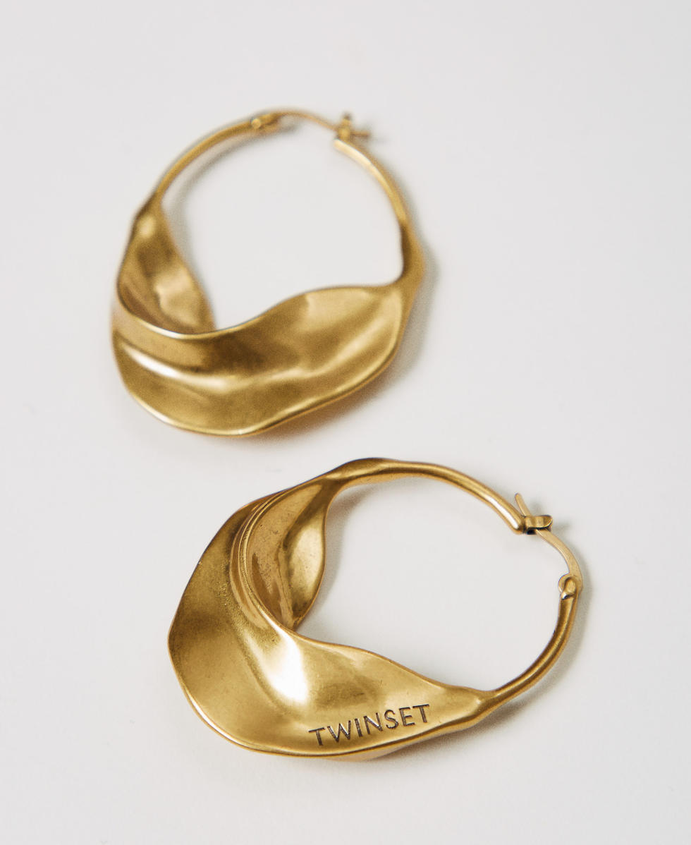 Boucles d&rsquo;oreilles en demi-lune