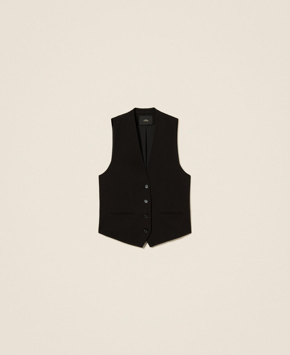 Gilet avec boutons et poches passepoilées