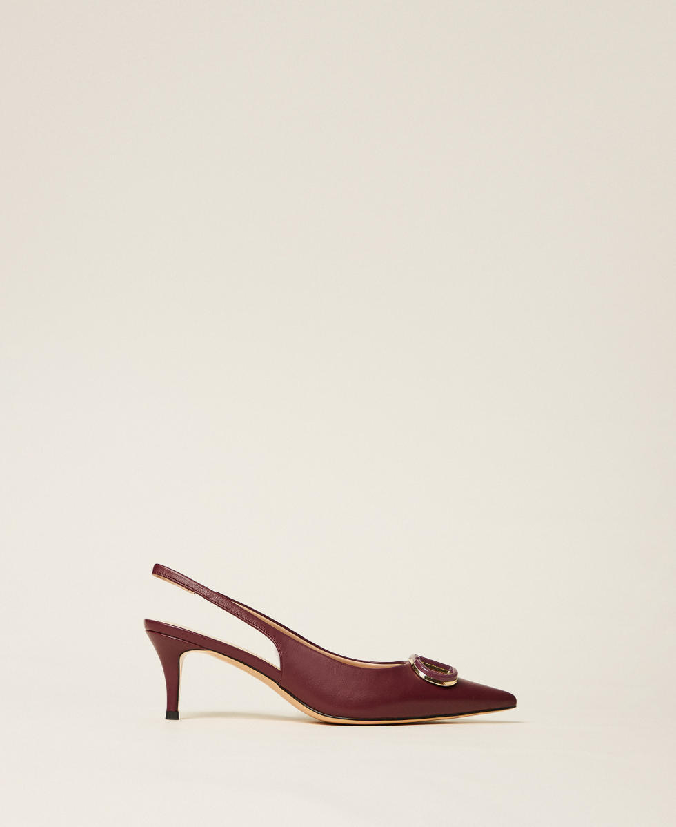 Sling back court shoes with Oval T