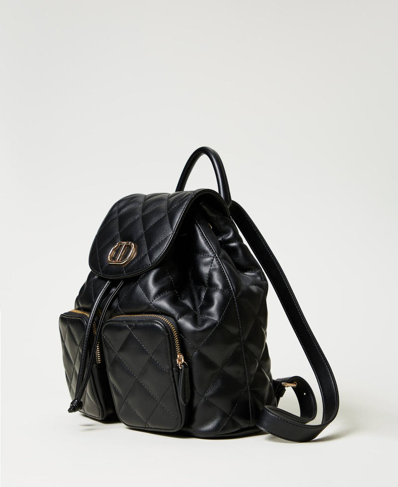 ‘Audrey’ quilted backpack with Oval T