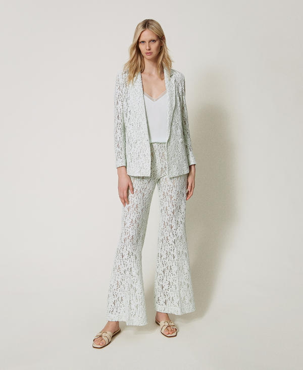 Flared trousers in floral lace