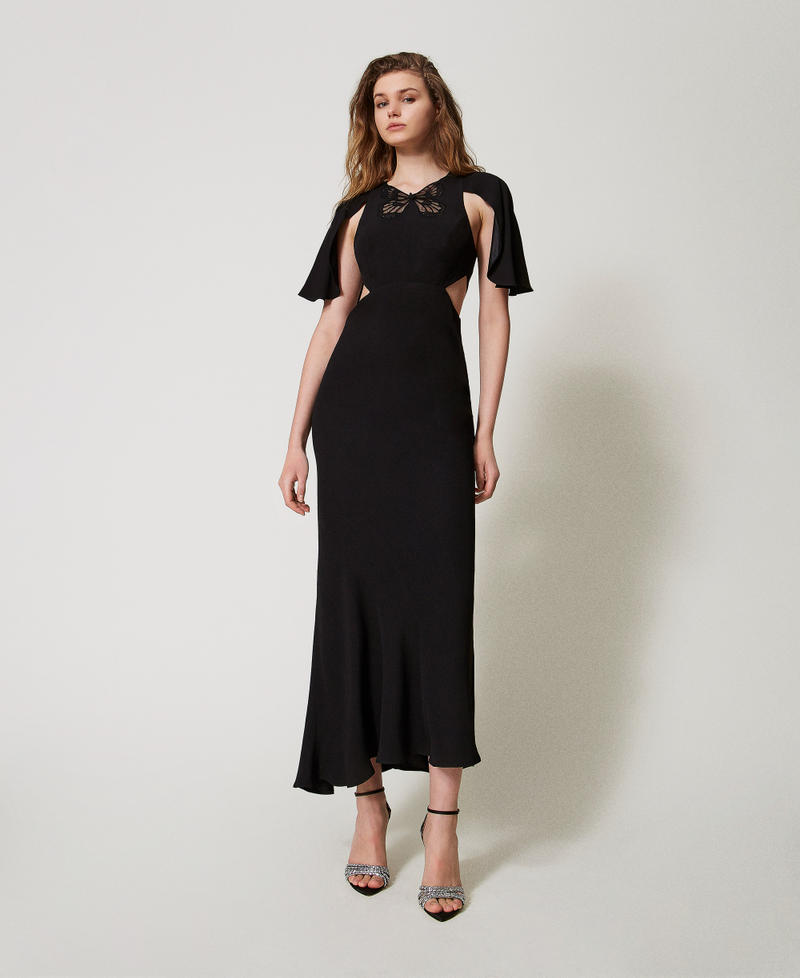 Long dress with cut-outs and an embroidered butterfly