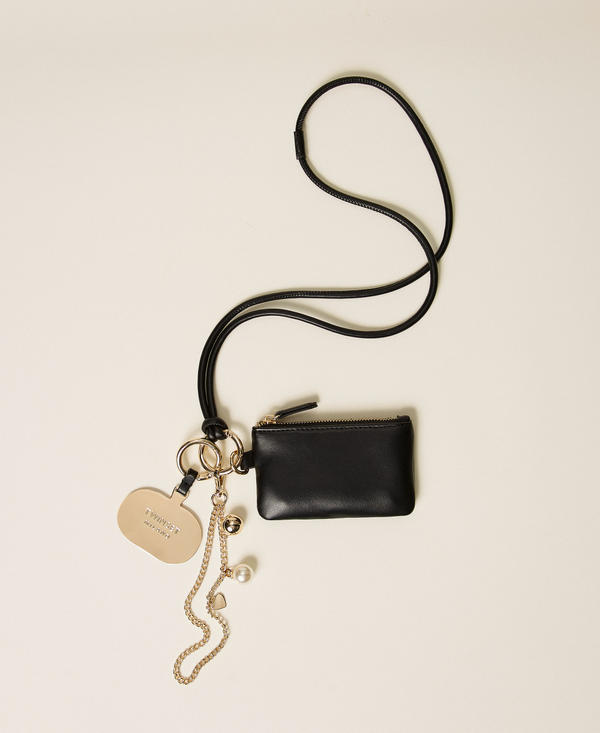 Coin holder with shoulder strap and charms