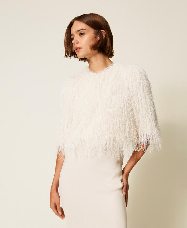 Cropped jacket with fringes