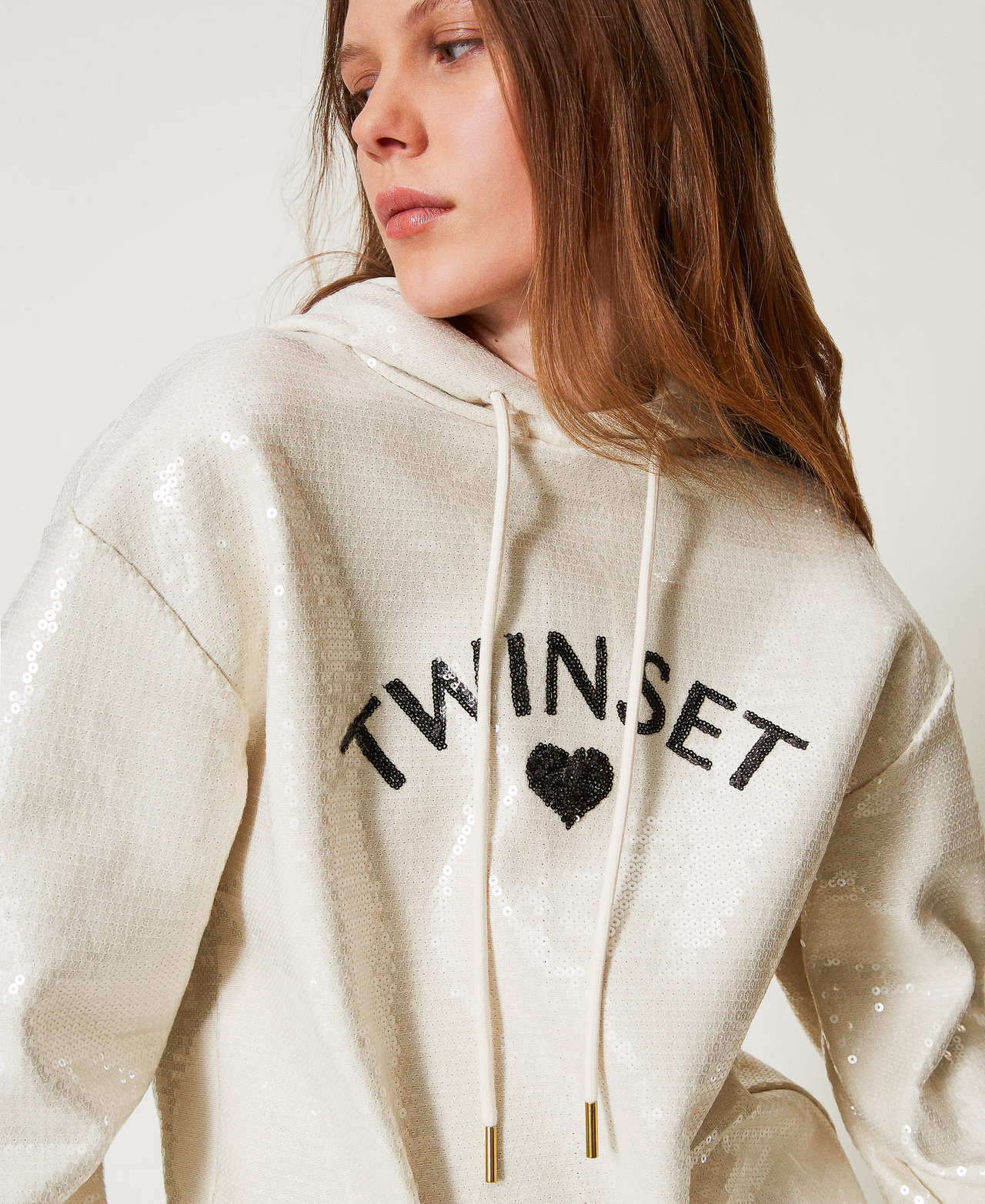Sweatshirt mit Alloverpailletten und Kapuze Beige Frau 251LL2SAA_00003_PD
