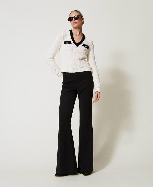 Jumper with Oval T buttons