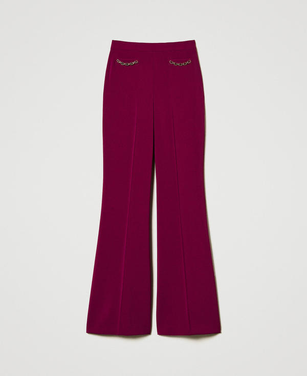 Pantaloni flare con catena Oval T
