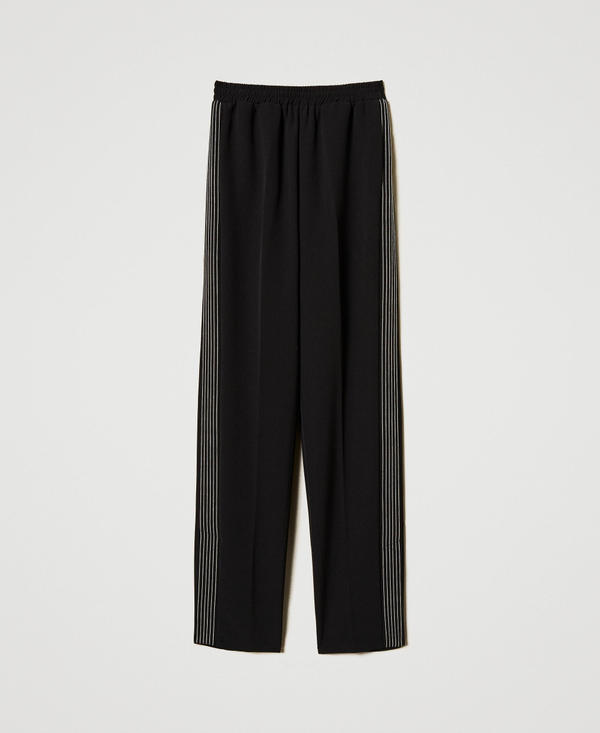 Pantaloni in cr&ecirc;pe con ricamo