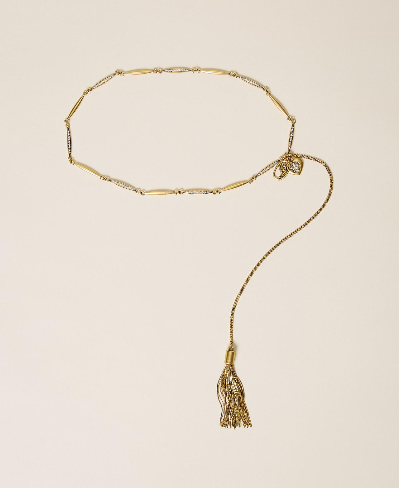 Chain belt with tassel pendant