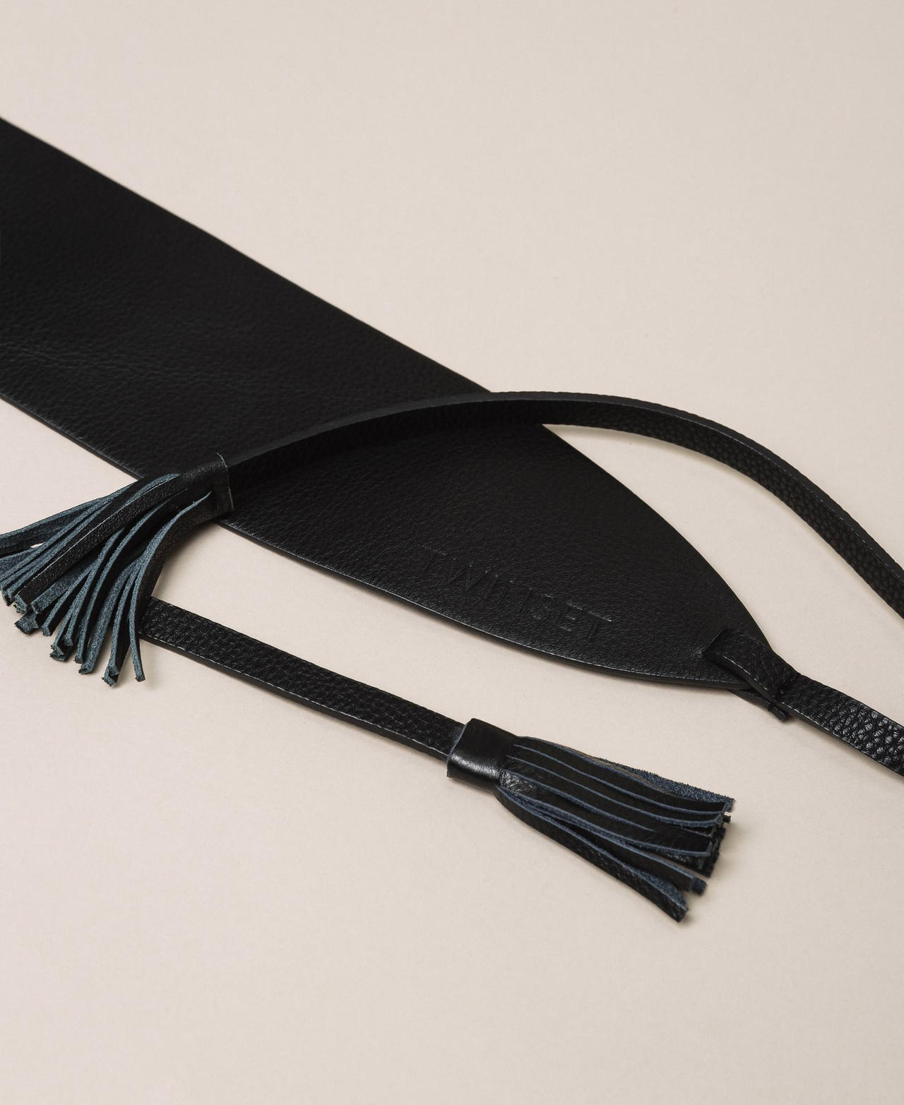 Leather belt with tassels