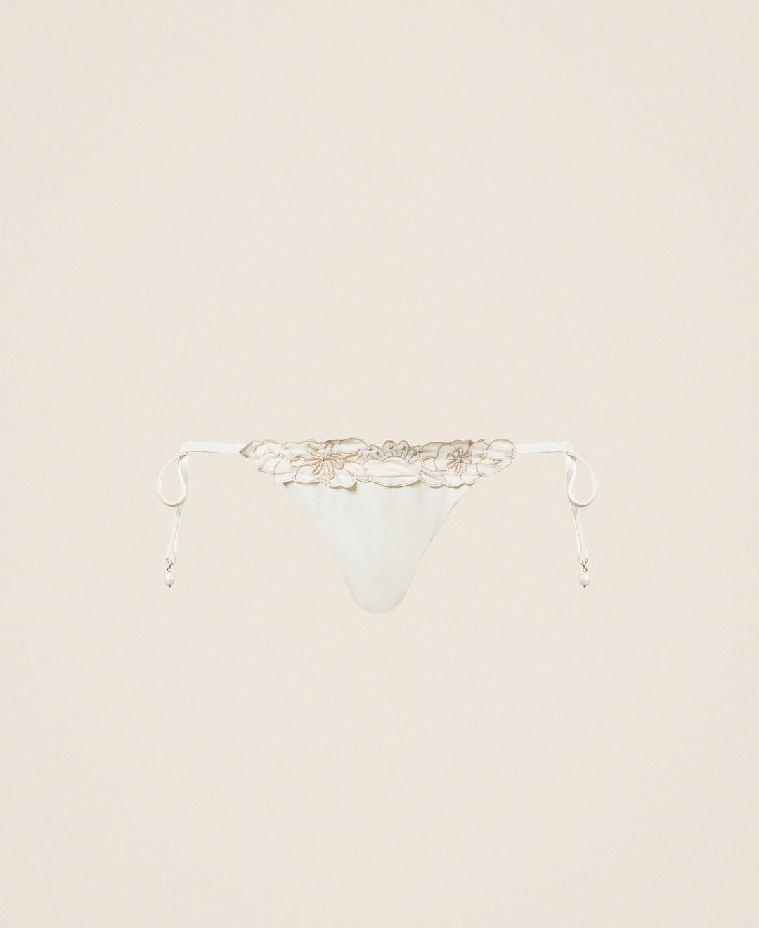 Slip brésilien de bain avec broderie florale