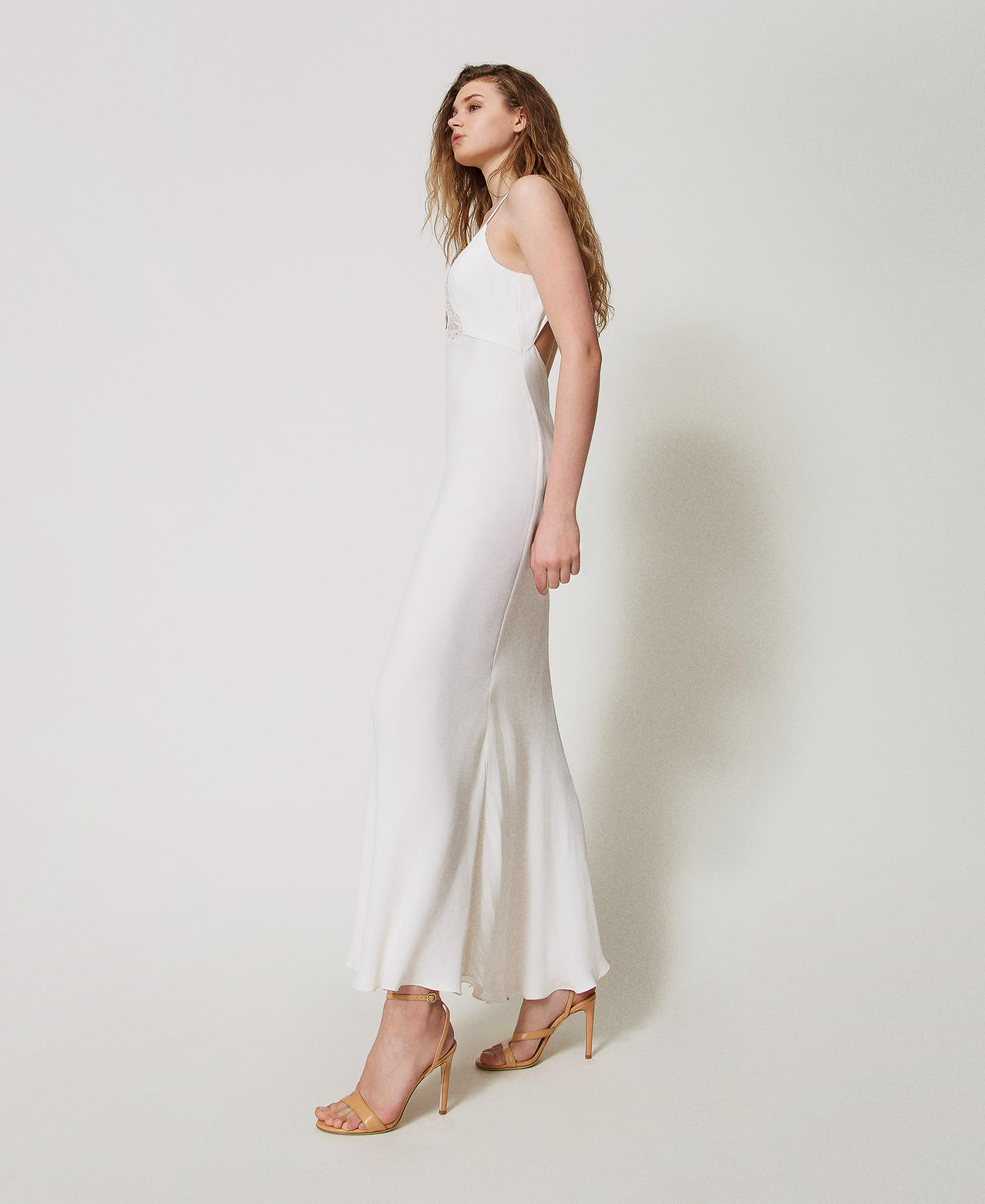 Long slip dress with an embroidered butterfly