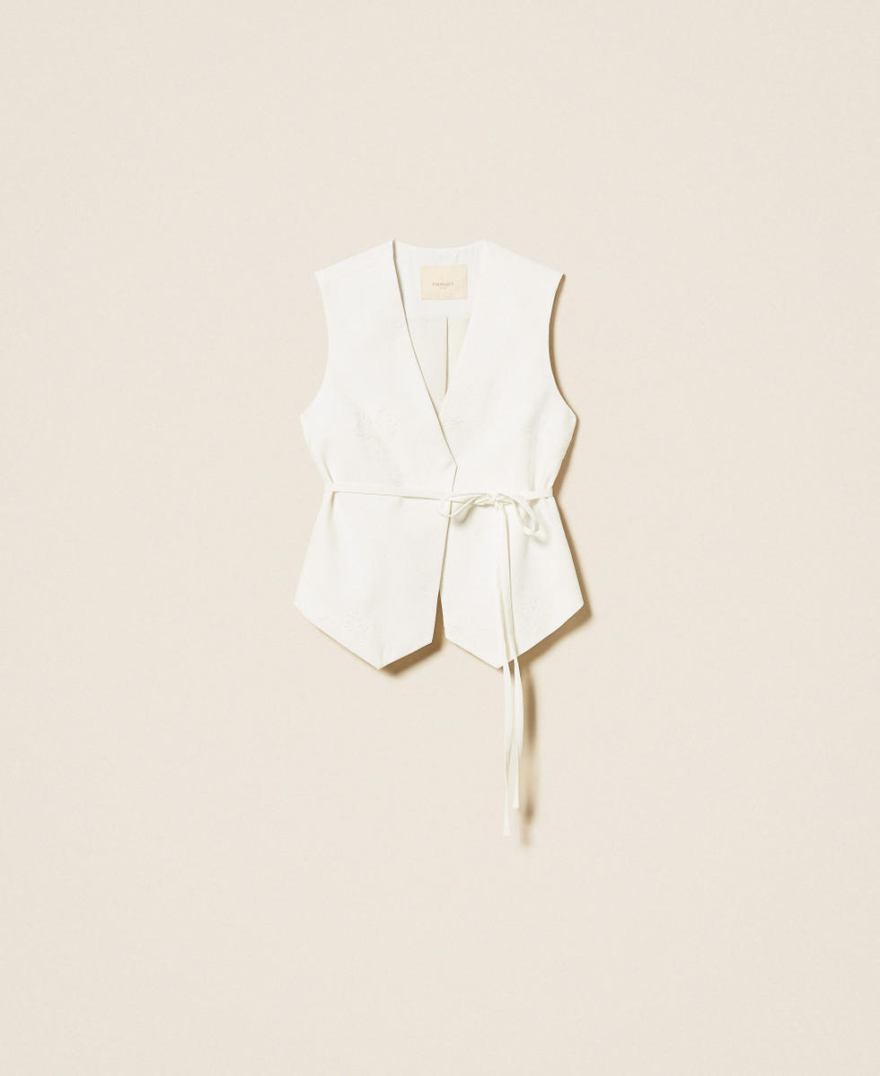 Embroidered waistcoat with belt