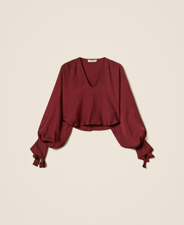 Satin shrug with rhinestones