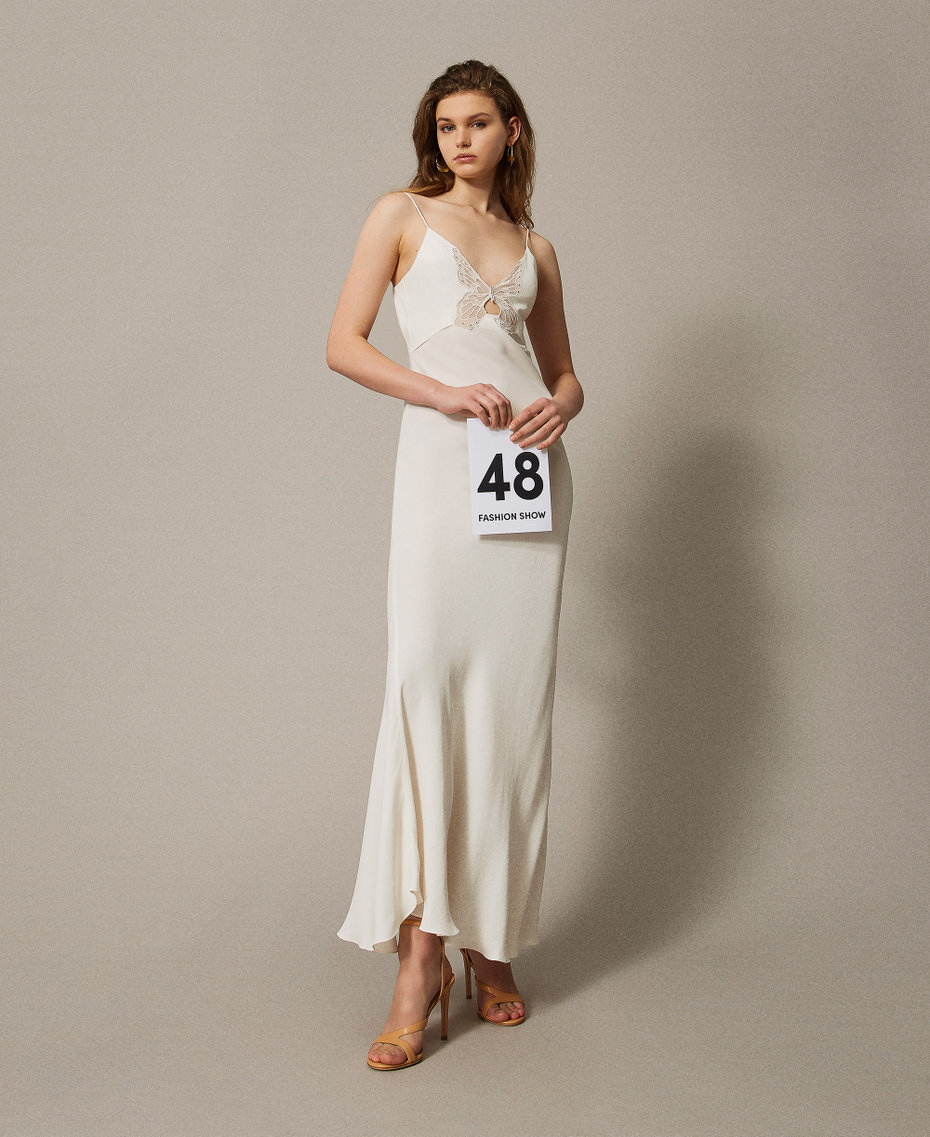 Long slip dress with an embroidered butterfly