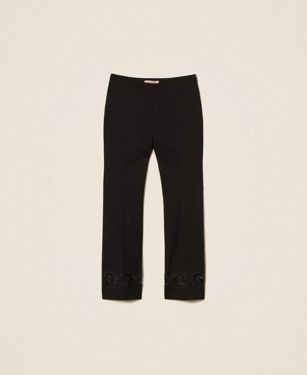 Брюки с цветочной вышивкой