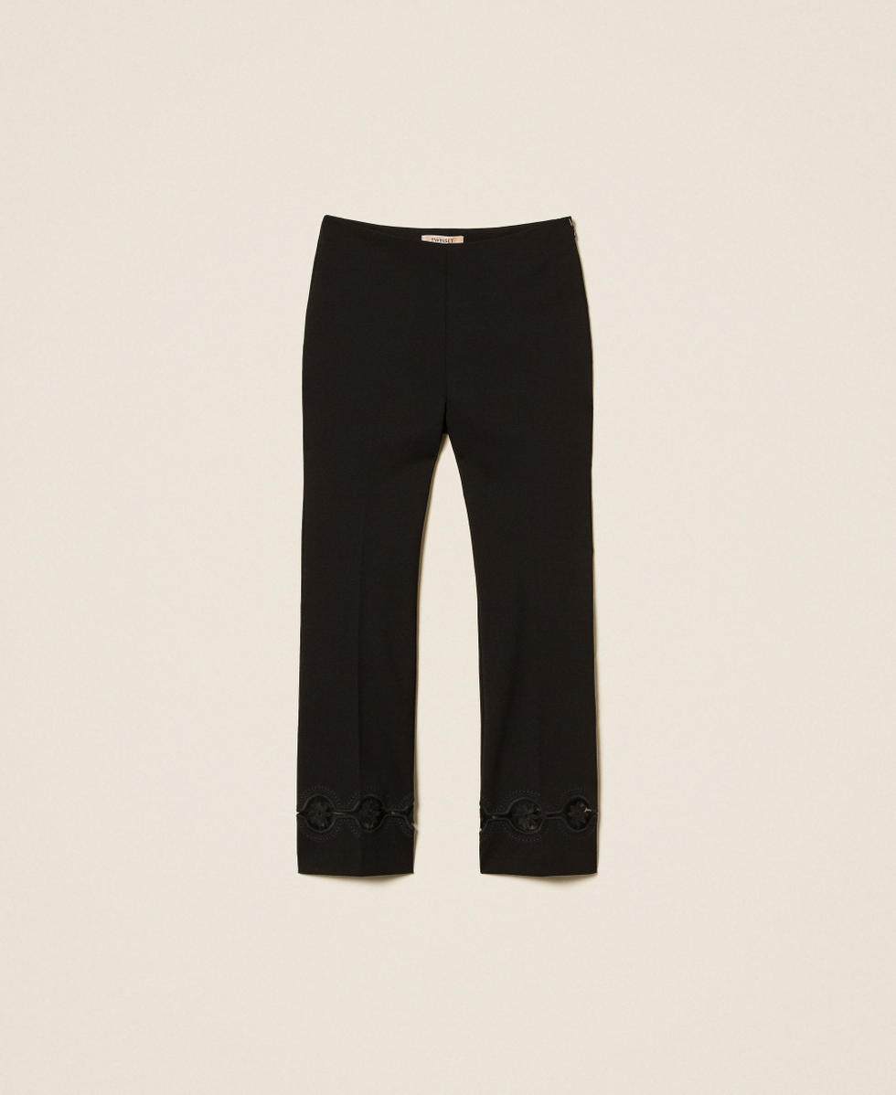 Pantaloni con ricamo a fiori