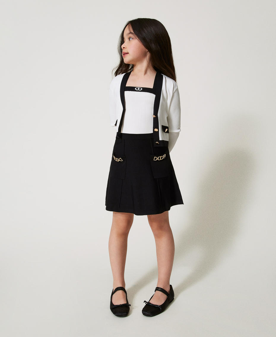 Knit miniskirt with Oval T clasps Black Girl 251GJ3QW3_00006_01