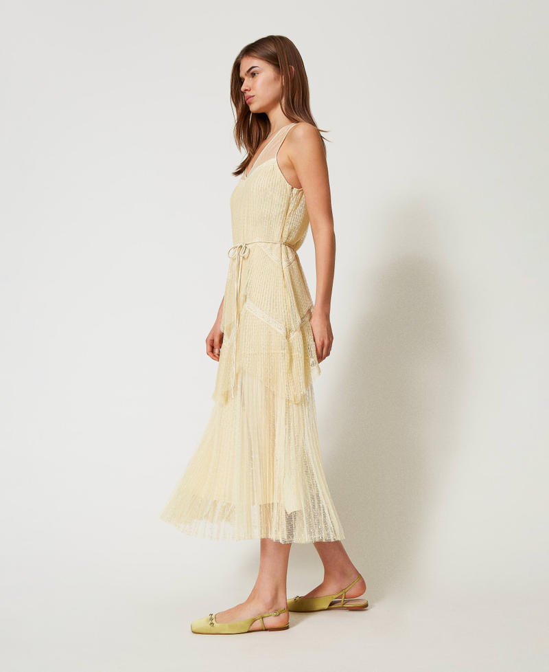 Abito lungo in tulle con balze plissé