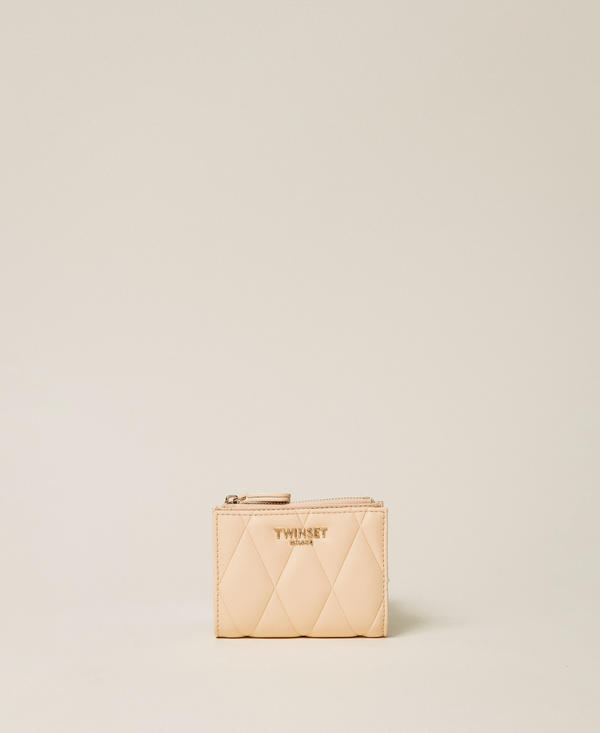 Portefeuille effet cuir matelass&eacute;