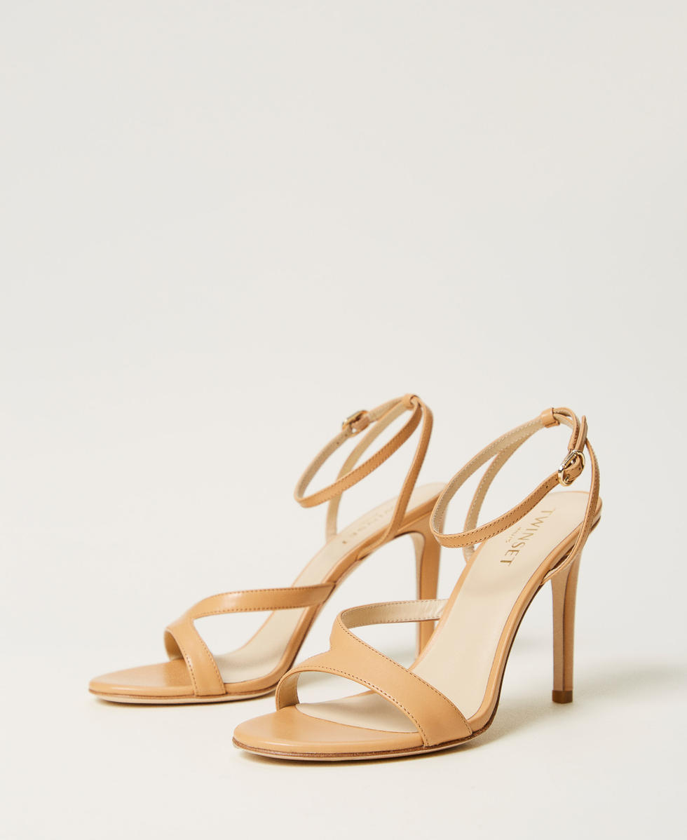 High-heeled leather sandals