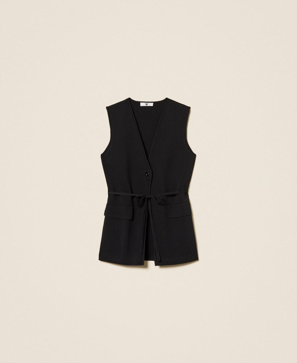 Fitted knit sleeveless jacket
