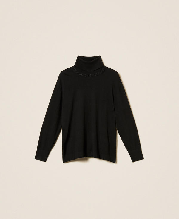 Maglia dolcevita lurex con treccia