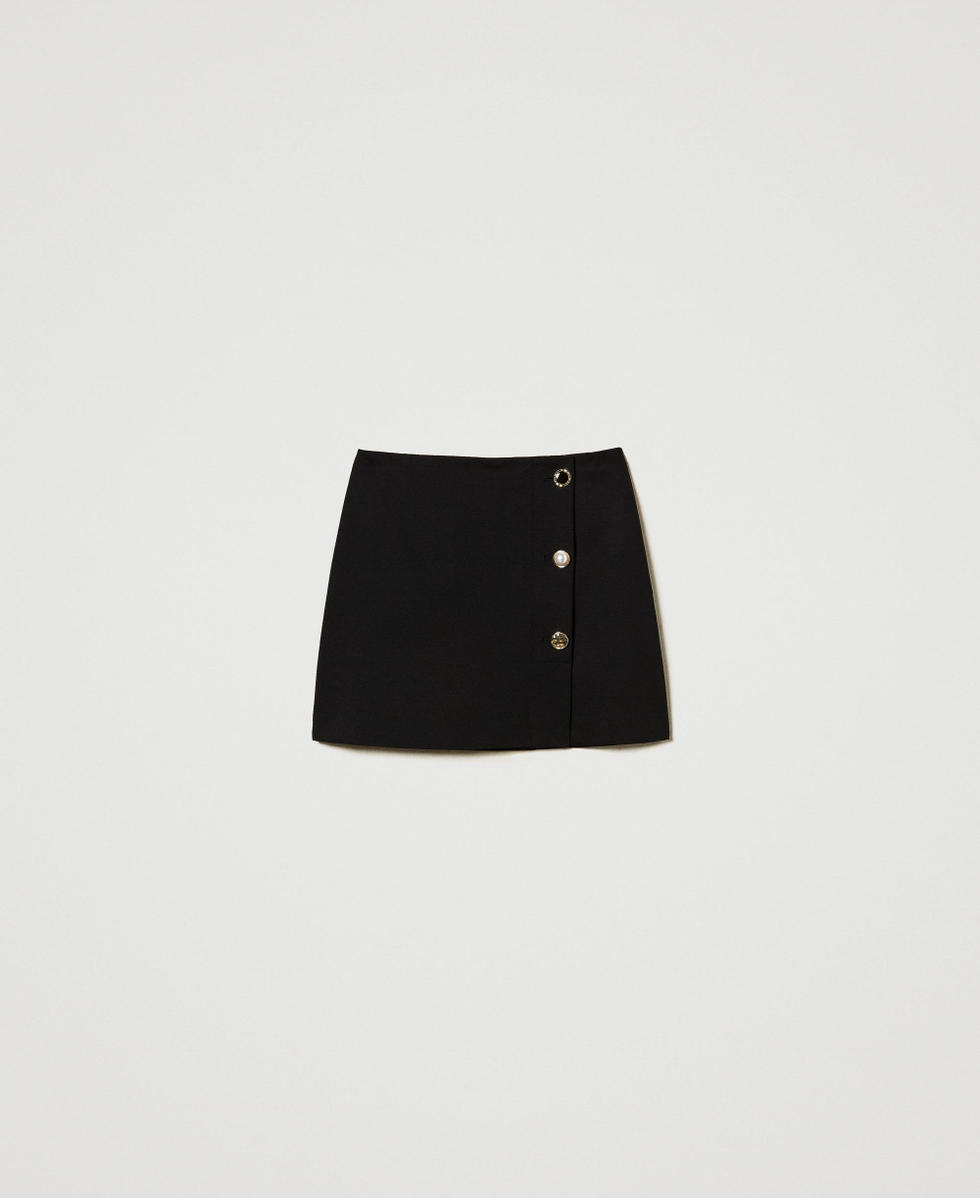 Miniskirt with jewel buttons