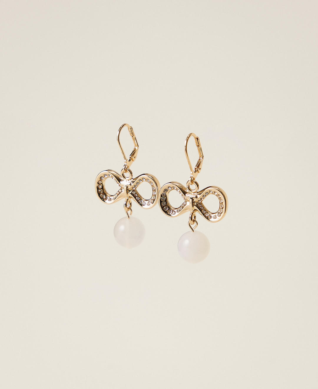 Boucles d'oreilles avec strass et logo