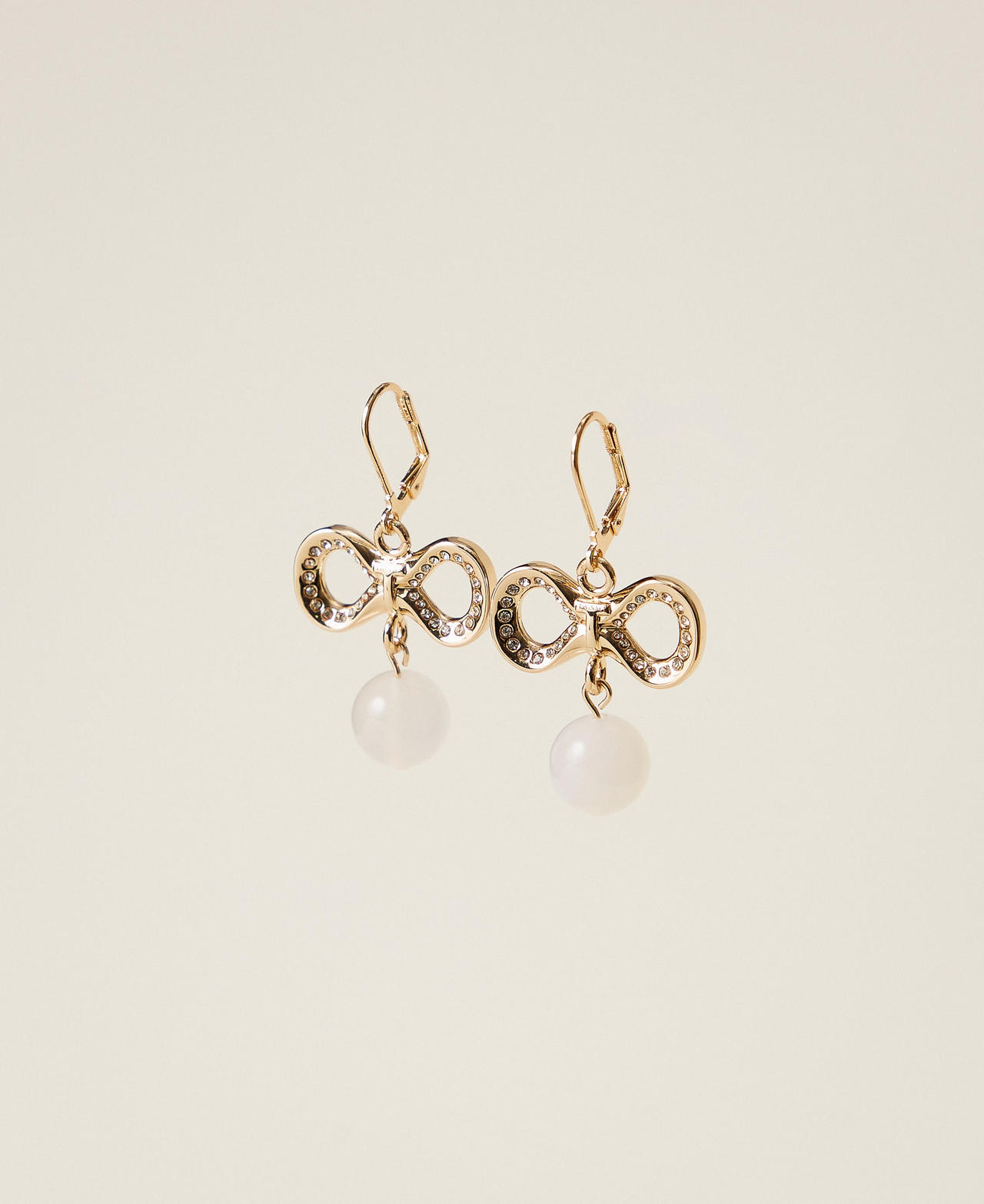 Boucles d'oreilles avec strass et logo