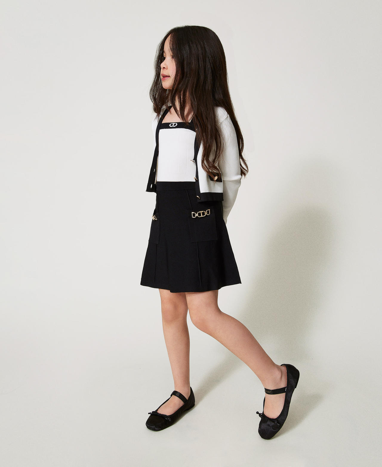 Knit miniskirt with Oval T clasps Black Girl 251GJ3QW3_00006_02