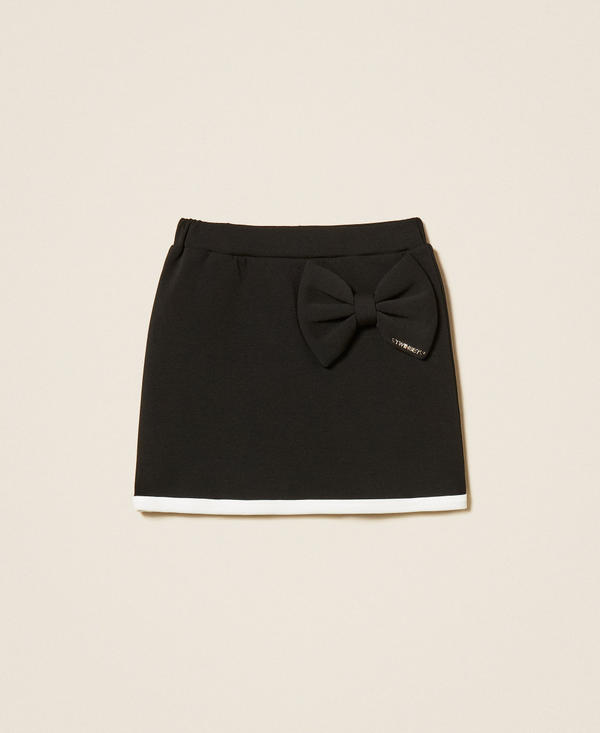 Baby&acute;s short skirt made from scuba fabric with bow