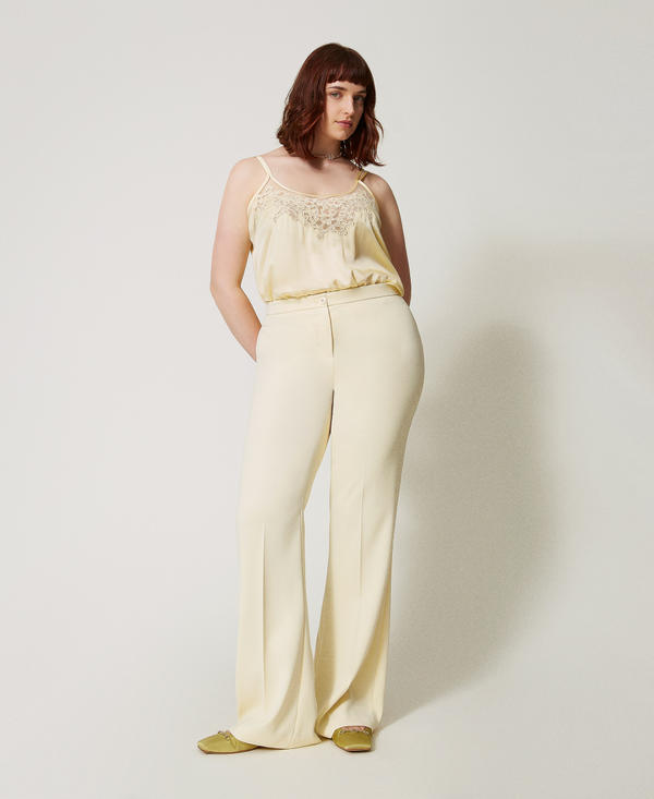 Fluid crêpe flared fitted leg trousers