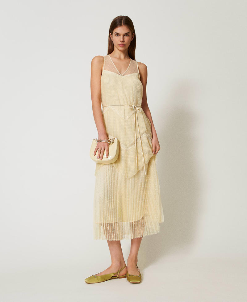 Abito lungo in tulle con balze plissé