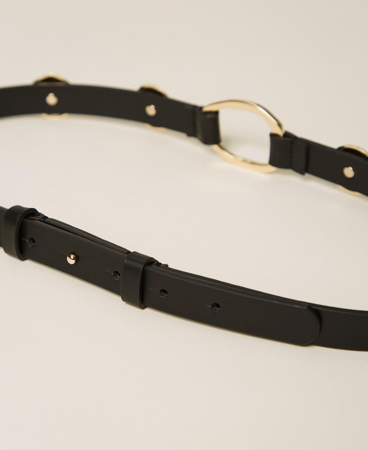 Cintur&oacute;n con anillas y tachuelas Negro Mujer 261TO5310_00006_03