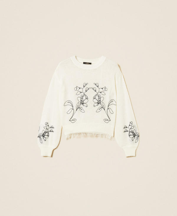 Jumper with floral embroidery and fringes