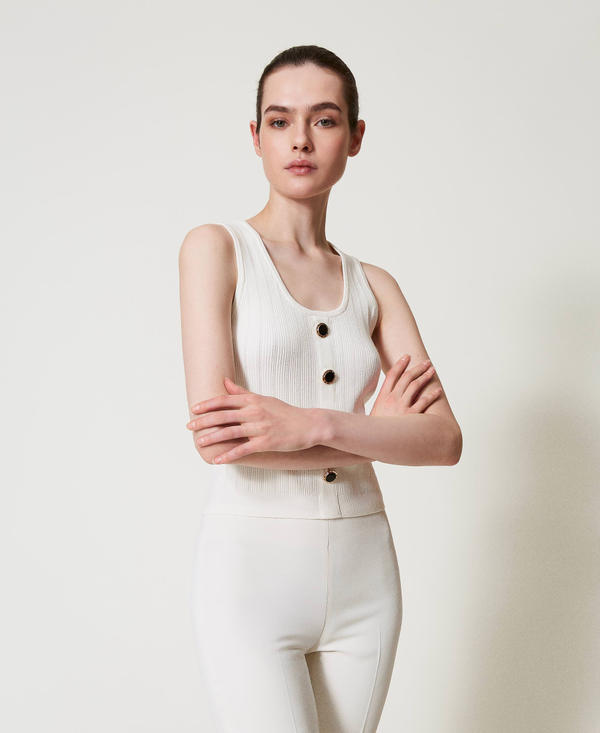 Knit top with decorative buttons
