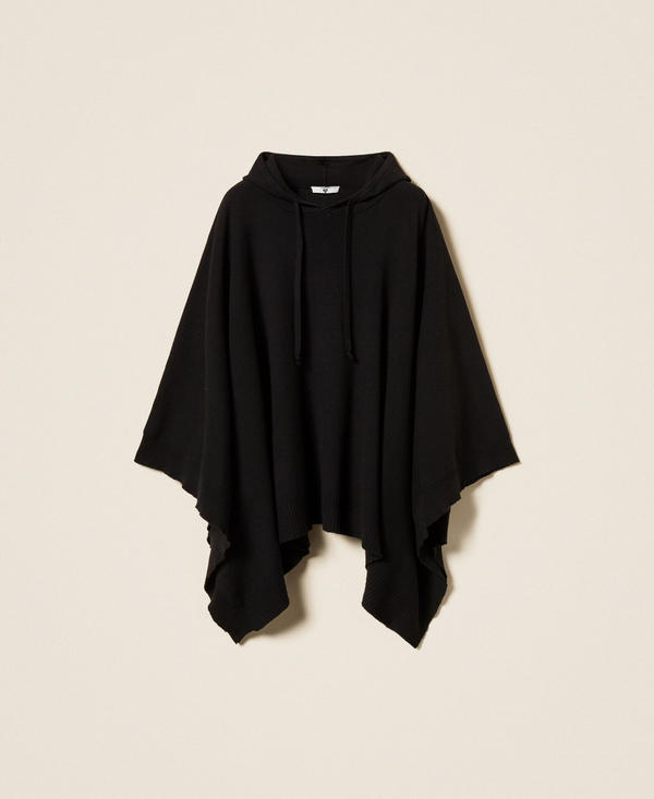 Knit cape with logo
