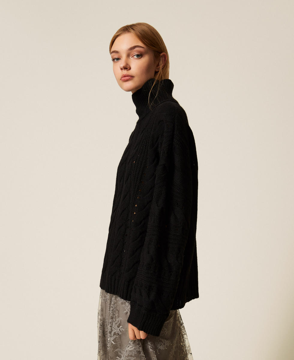 Longpullover aus Wollmischung mit Z&ouml;pfen Schwarz Frau 252TT3101_00006_02