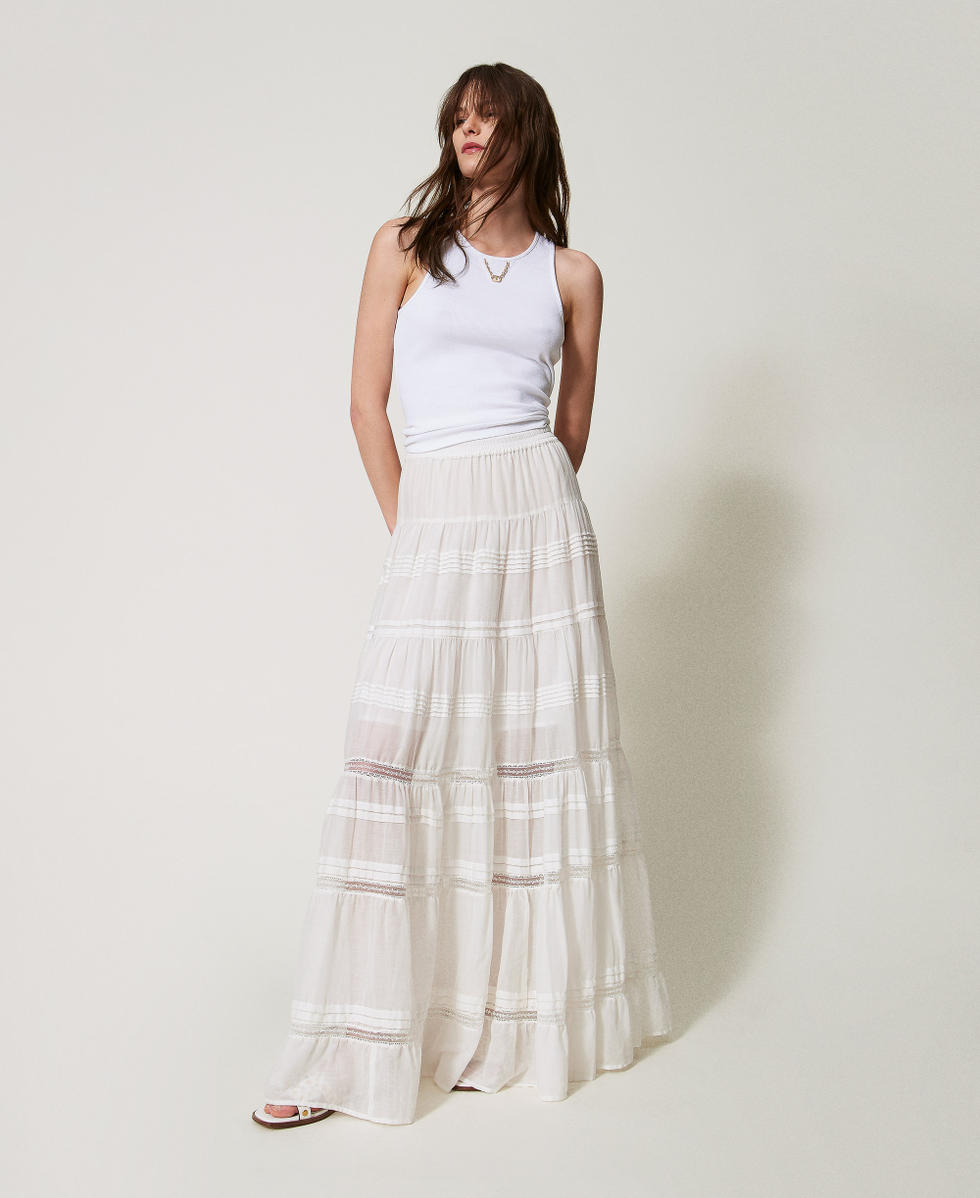 Long muslin skirt with flounces