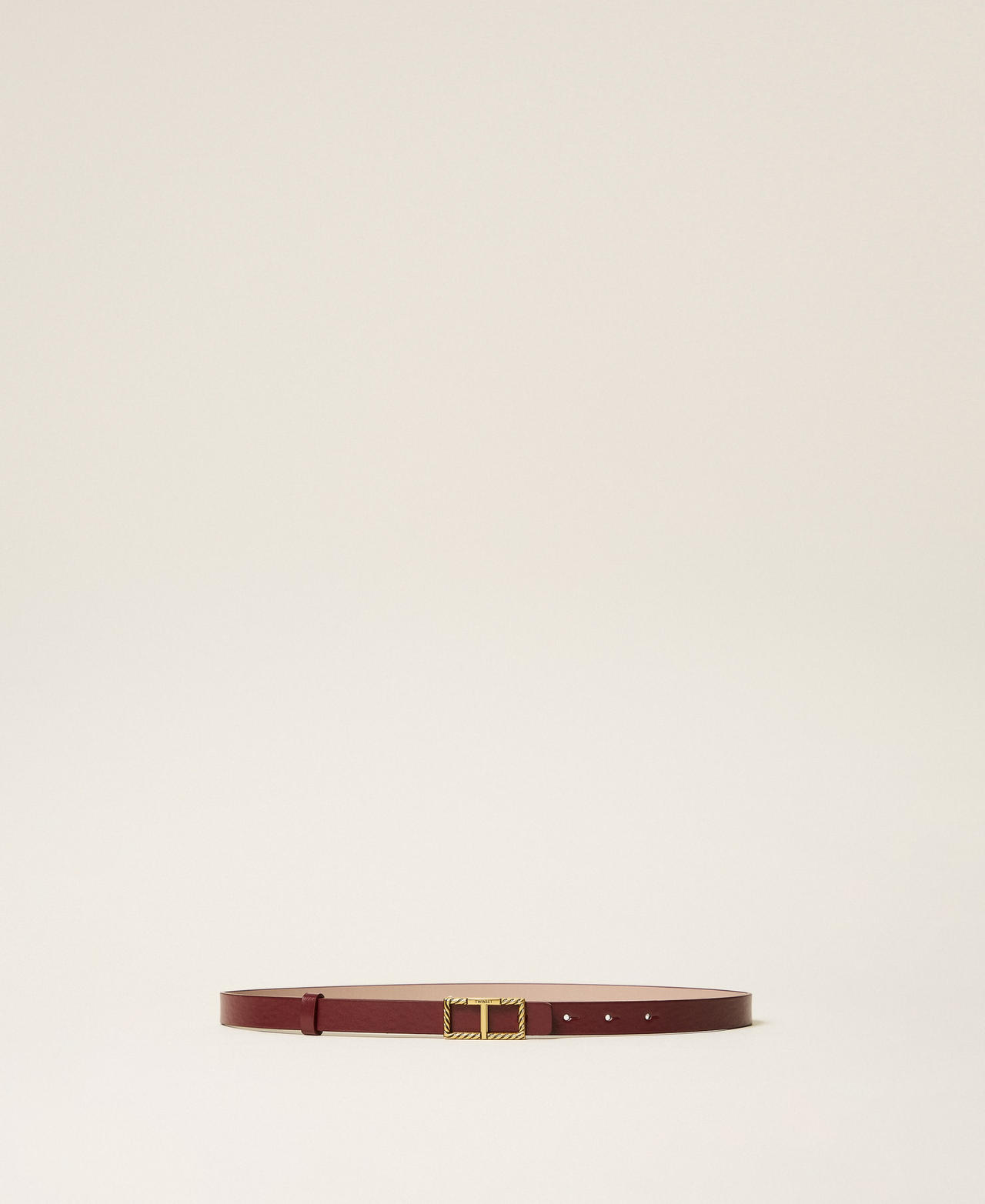 Reversible belt with logoed buckle